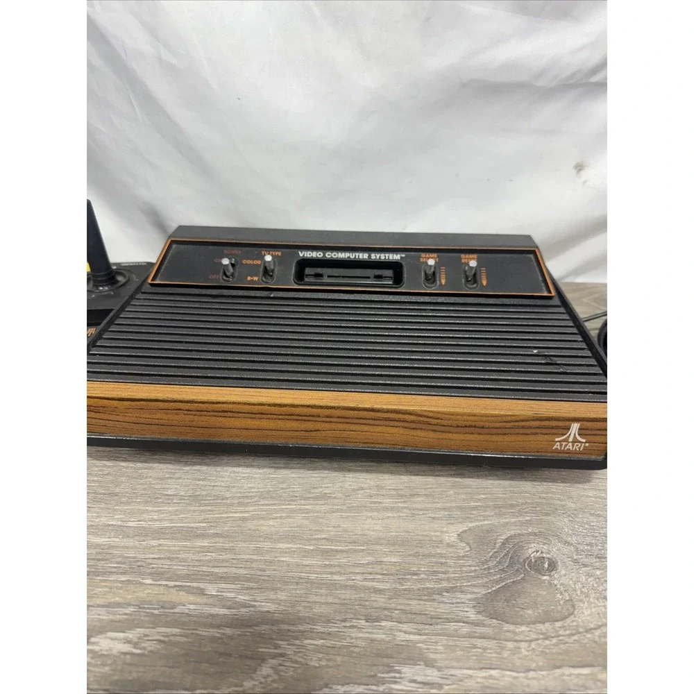 Atari 2600 4-Switch Woodgrain Console Bundle w/ 2 Joysticks, 4 Games Working